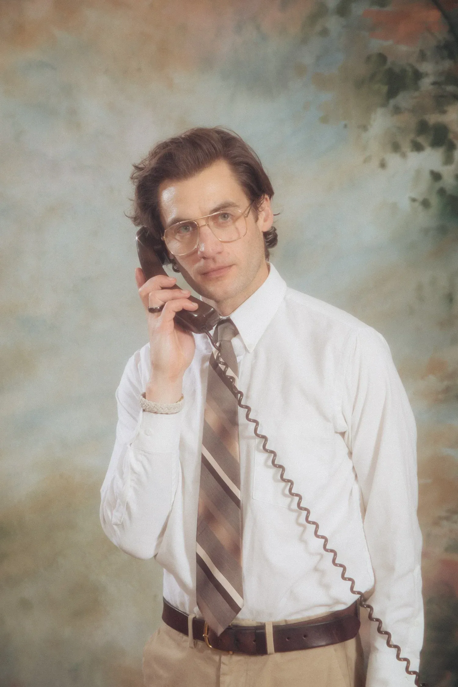 John Champion Vieira on the telephone, in a vintage studio portrait